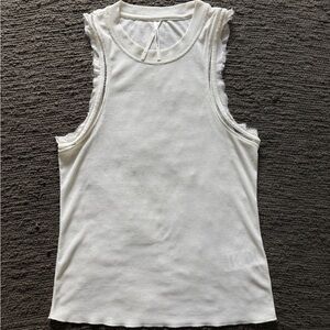 Anthropologie White Tank Top with Elegant Design